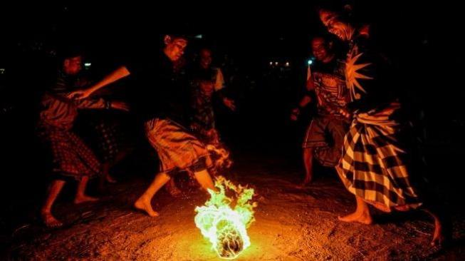 Kicking Flames: The Fiery Football Rituals of Indonesia's Muharam